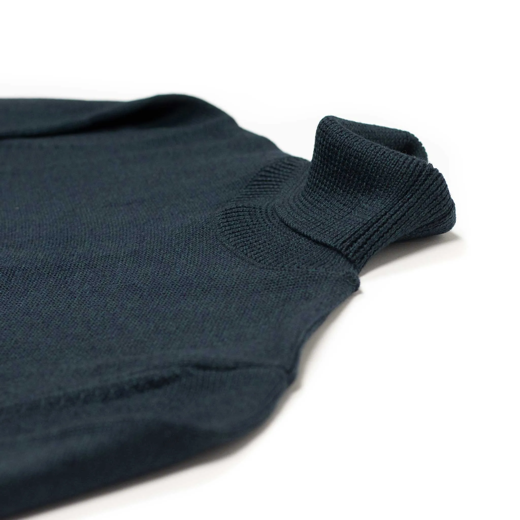 Rollneck sweater in petrol superfine merino wool